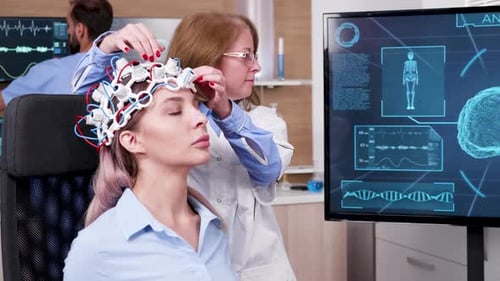 Female Doctor in Brain Science Lookin at Tv Screen