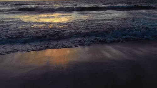 Flight at Sunset Overlooking the Indian Ocean in Bali Indonesia