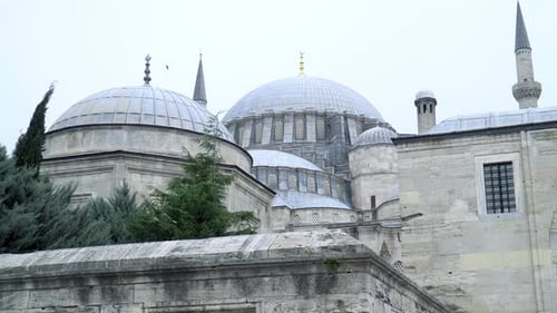 Dolly backward shot of Suleiman Mosque in Istanbul, Turkey