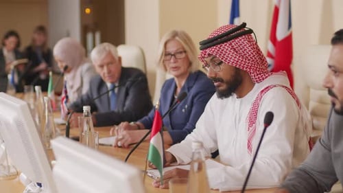 International Meeting with Delegates at Conference Table