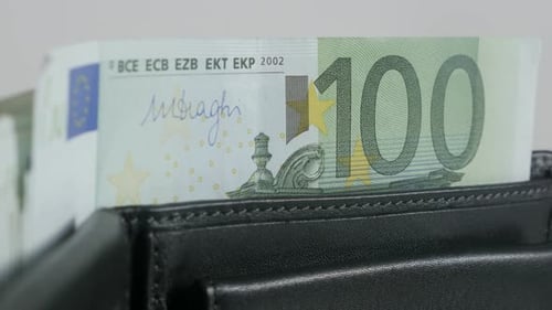 Close Up of Black Leather Wallet and Euros