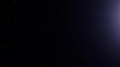 Abstract movement of golden particles emitted by rays and shimmering.