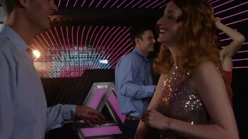 Couple dancing in pub