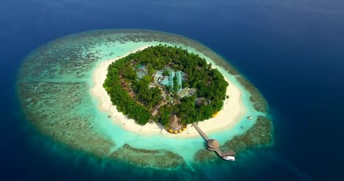 Aerial drone view of scenic tropical islands in the Maldives.