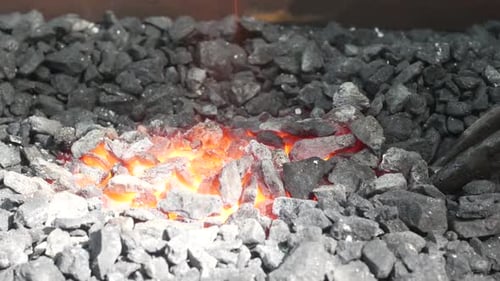 Glowing Embers of an Active Forge