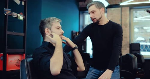 Man Getting Hair Styled by Barber Indoors