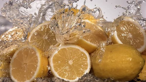 Lemons with Water Splashing