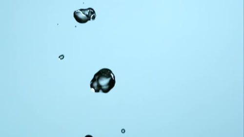 Water Stream Pouring in Slow Motion