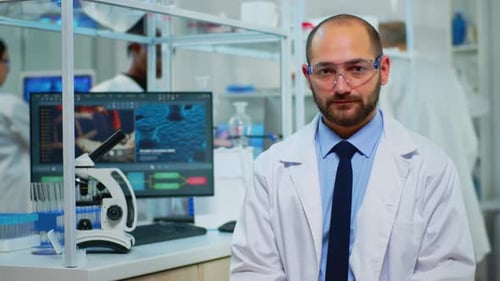 Man in Lab Coat in Scientific Laboratory