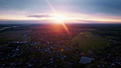 Aerial View of a Village at Sunset