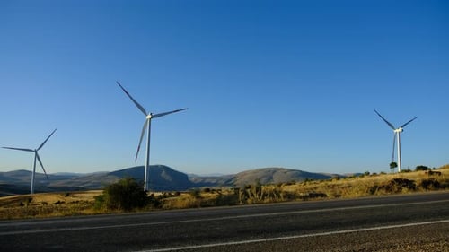 Wind Turbines Spinning on a Sunny Day