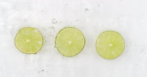 Lime Slices Refreshing with Water Droplets