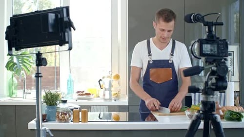 Man Cooking in Bright Modern Kitchen