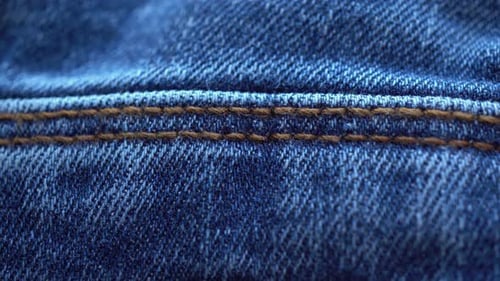 Extreme Close Up of Textured Blue Denim Fabric