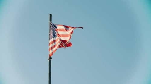 US Flag Waving Proudly in the Wind