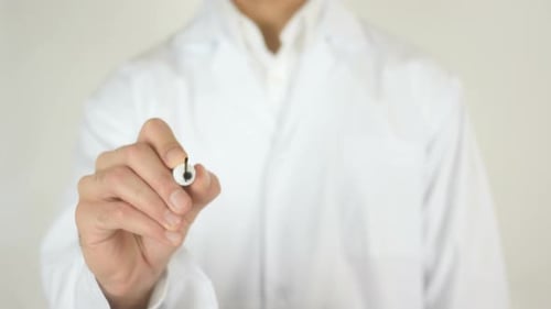 Scientist Writes 'Health' Concept on Glass