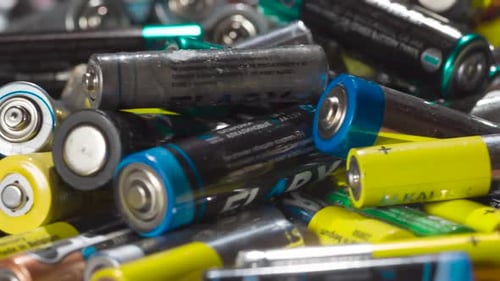 Pile of Used Batteries for Recycling E-Waste