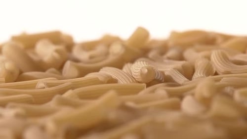 Falling Down Italian Pasta, on White, Rotation, Close Up, Slow Motion