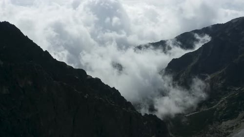 Clouds Between Mountains
