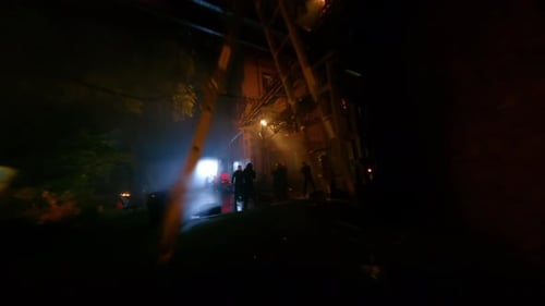 Street Fighters Trainings at Rainy Night Hood Surrounded By Barrels of Fire