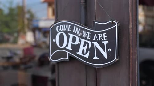 Open Sign In Front Of Cafe Or Restaurant