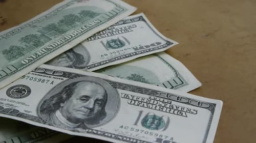 Rotating stock footage shot of $100 bills - MONEY 0146