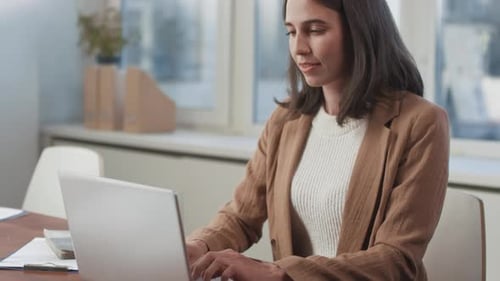 Young Woman Working In Office