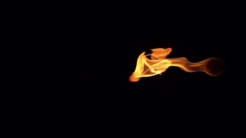 Fiery Flame Flickering on Black Background