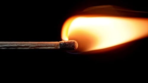 Match Ignites and Burns in Extreme Close Up