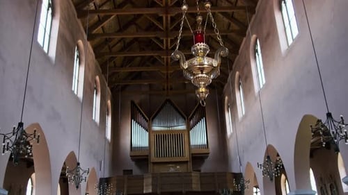 Empty Catholic Cathedral Inside Wooden Benches for Prayers Church Interior