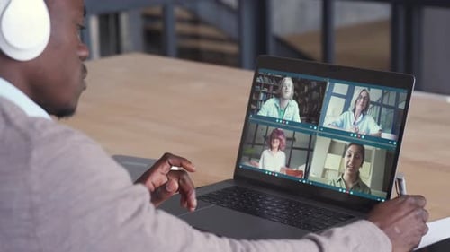 African Businessman Having Virtual Team Meeting on Video Conference Call
