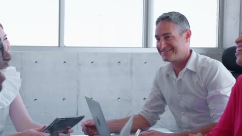 Multi-ethnic business people interacting with each other in modern office 4k