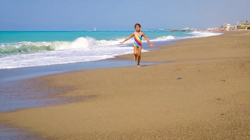 Child Running on the Beach