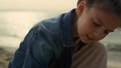 Happy Kid Playing Beach at Summer Sea
