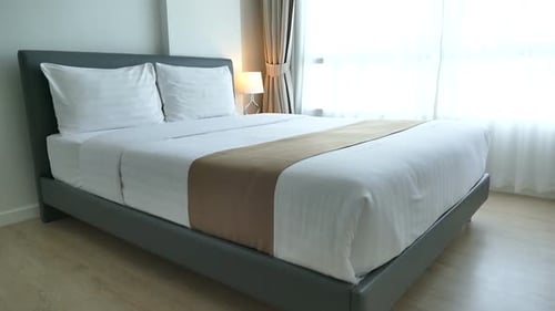 Bedroom with Bed and Natural Light