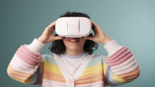 Woman Wearing VR Headset Experiencing Virtual Reality