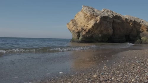 Sea Surf. Seashore with Stones