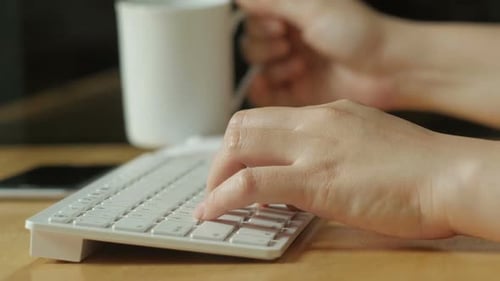 Working And Drinking Coffee