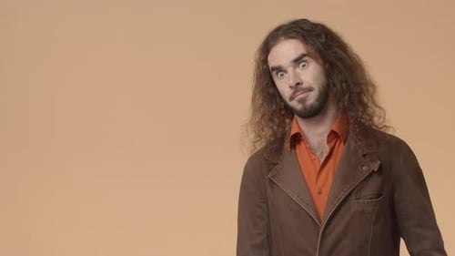 Man Gesturing to Side with Copy Space