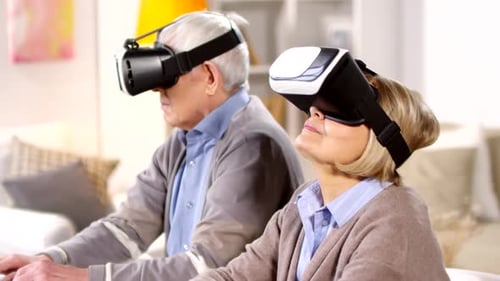 Seniors Explore Virtual Reality with VR Headsets Indoors