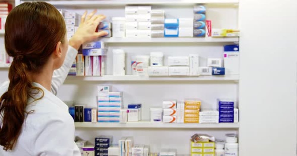 Top 20 Global Merchandising Solutions For Health &Amp; Wellness Brands - Prioocare Pharmacist Checking A Medicine In Pharmacy, Medical Stock Footage Ft. Pharmacy &Amp; Dispensary - Envato