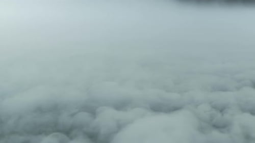 Ethereal Aerial View of Gray and White Fog