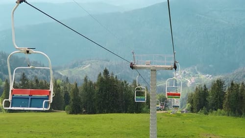 View From the Chair of the Cable Car on the Panorama of the Mountains on a Summer Sunny Day