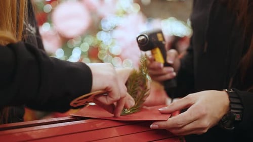 Close Up of Making Beautiful Red Letters for Santa Claus with Christmas Decor