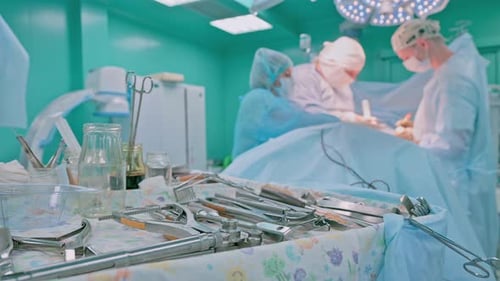 Surgeons Perform Operation in Hospital Operating Room