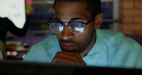 Businessman working on computer in a modern office 4k