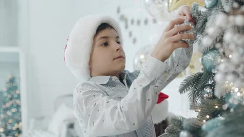 Children Decorating Christmas Tree with Shiny Ornaments
