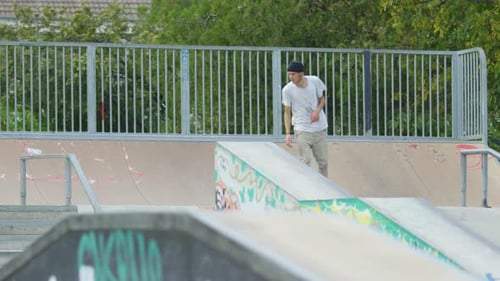 Skating and falling in a skatepark