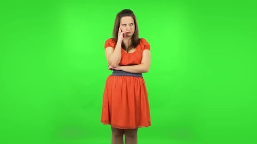 Cute Girl Focused Thinking About Something. Green Screen