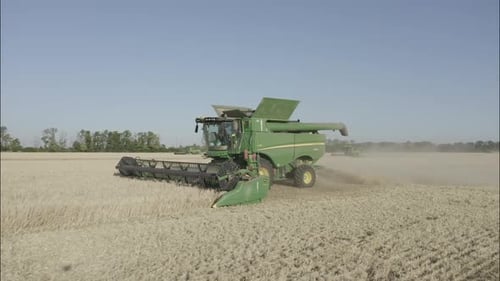 Combine Harvesting Wheat Top View of a Wheatfield